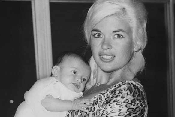 A six-week-old Mariska with her mother   in March, 1964.