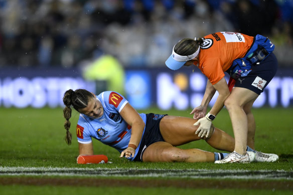 Sky Blues centre Jess Sergis struggles with a leg injury.
