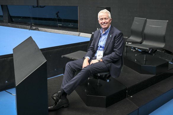 Australian Open boss Craig Tiley sits in one of the new courtside pods.