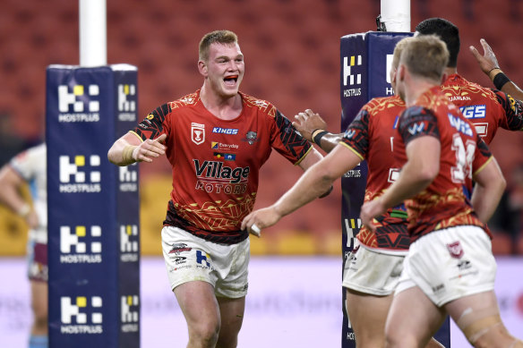 Ryan Jackson celebrates scoring for the Redcliffe Dolphins.