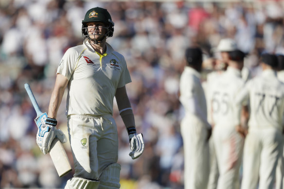 Steve Smith leaves the pitch after he was out lbw by Chris Woakes.
