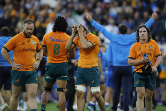 Wallabies players after their one-point defeat to Italy.