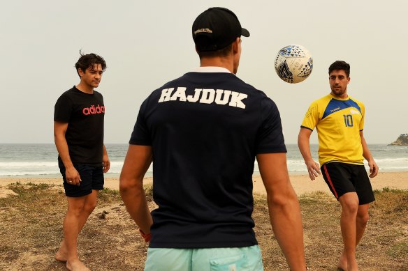 Daniel Jadric from Canberra (in yellow) at Malua Bay with his brother Josip (centre) and friend Nikolas Barisic (left).