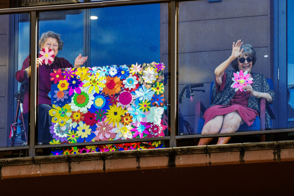 Residents of Arcare Knox receive students' floral creations.