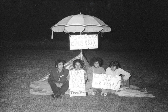 (L-R) Michael Anderson, Billie Craigie, Bert Williams and Tony Coorey on  January 26, 1972, on the lawns in front of Old Parliament House. The beach umbrella embassy was the idea of Coorey.