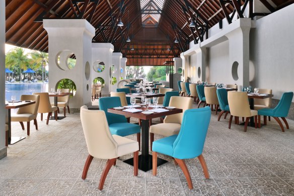 Open-air Olive Restaurant and Pool Bar.