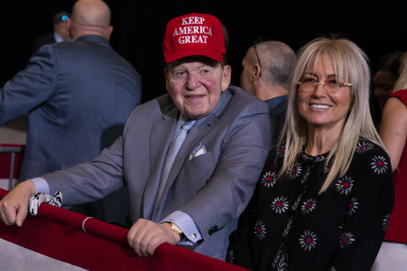 Miriam Adelson and late husband Sheldon await Donald Trump’s arrival at a campaign rally in 2020.