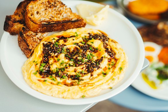 Scrambled eggs with black lime za’atar crisp.