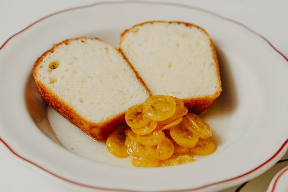 Baba au Calvados is a yeasty sponge splashed with apple brandy amd served with candied kumquats.