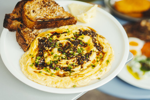 Scrambled eggs with black lime za’atar crisp, sourdough and cultured butter.