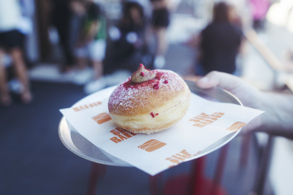 Raspberry and pistacio-filled donut at Self Raised Snack Shoppe.