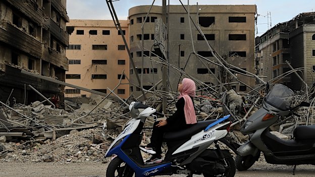 Manessa Ali, 10, surveys the damage in Dahiyeh, Beirut, in the aftermath of the October 5 Israeli strike on a medical facility on the airport road.