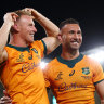 Quade Cooper, right, celebrates with Reece Hodge after kicking the winning penalty last weekend.