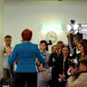 Hanson casts a long shadow in front of the press.