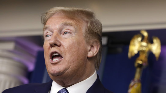 US President Donald Trump speaks during a news conference at the White House in Washington DC.