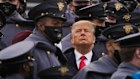Surrounded by Army cadets, President Donald Trump watches the first half of the 121st Army-Navy Football Game last month.