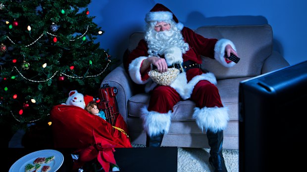 Even Santa needs a break in front of the box sometimes.