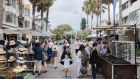 People shop at Bondi Beach on 09 January, 2024. Photo: Brook Mitchell for the AFR