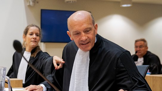 Sabine ten Doesschate, left, and Boudewijn van Eijck, lawyers for one of the four suspects, Russian Oleg Pulatov, are seen at the trial at the high security court building at Schiphol Airport, near Amsterdam. 