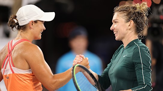 Respect: Ashleigh Barty (left) and Simona Halep.