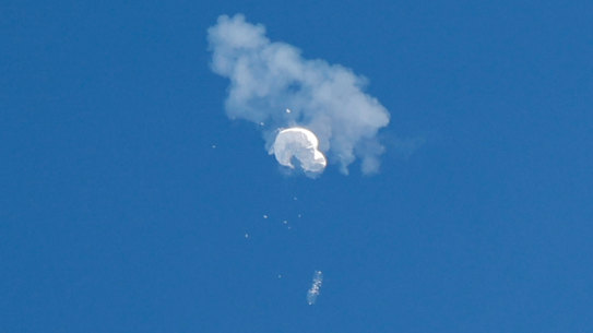 The suspected Chinese spy balloon drifts to the ocean after being shot down off the coast from Surfside Beach, South Carolina.