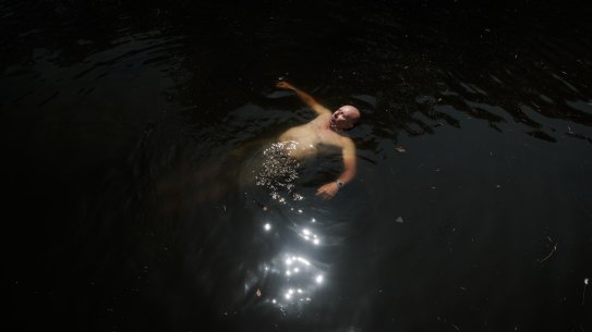 Local resident Barney Soloman swims in the Cooks River at Boat Harbour, Hurlstone Park (it’s not recommended)