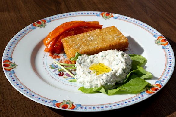 Smoked trout, hash brown and fresh cheese.