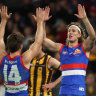 E, AUSTRALIA - JUNE 24: Aaron Naughton of the Bulldogs celebrates after scoring a goal during the round 15 AFL match between the Western Bulldogs and the Hawthorn Hawks at Marvel Stadium on June 24, 2022 in Melbourne, Australia. (Photo by Robert Cianflone/Getty Images)