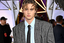 Aussie actor Joseph Zada, who plays a young Haymitch, in a look that makes us want to throw our boyfriend’s basic belts in the bin. 