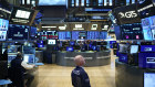 While some on the Street see the derivatives as reducing market volatility, others led by JPMorgan see them as a source of extreme turbulence.
