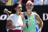 Casey Dellacqua interviews Ashleigh Barty on court at the 2020 Australian Open.