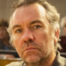 Brendan Cowell plays jury member Garry, a dog-track loving gambling addict, in The Twelve.