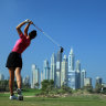 Michelle Wie tees off in Dubai in 2012.