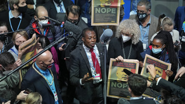 Emmanuel Tachie-Obeng from Ghana speaks to reporters ahead of the Glasgow climate summit’s final day.
