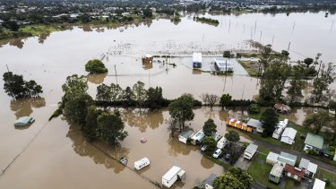 Low-lying parts of Singleton are inundated by floodwaters along the Hunter River. 