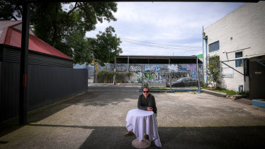 Justin Stanford in what's now a nine-car parking lot, soon to become an open-air space for visitors to his venue, The Night Cat in Fitzroy.