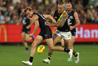 Lochie O’Brien (left), leading Dustin Martin to the ball, has revived his career on the wing for the Blues this season.
