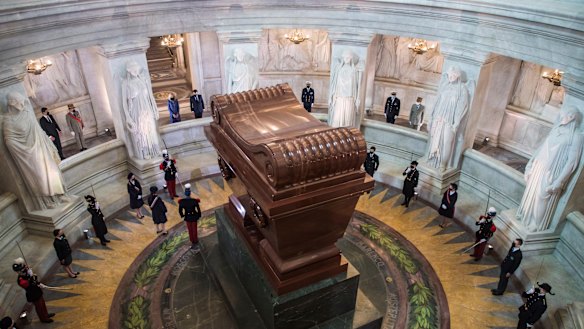 French President Emmanuel Macron and his wife, Brigitte, (top left) stand by the tomb of Napoleon Bonaparte.