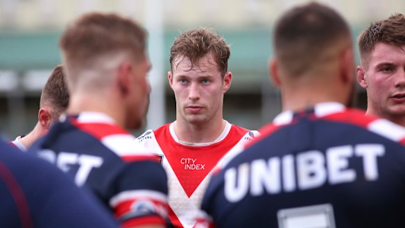 Sam Walker gets acquainted with his new teammates after being dropped to reserve grade last season.