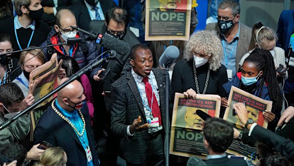 Emmanuel Tachie-Obeng from Ghana speaks to reporters ahead of the Glasgow climate summit’s final day.