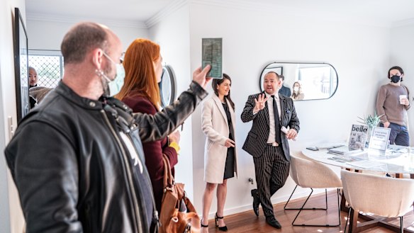 Underbidder Jason and buyer’s agent Michelle at the auction of unit 28 in the same complex.