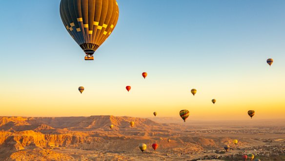 Hot-air balloons over Temple of Hatshepsut near Luxor