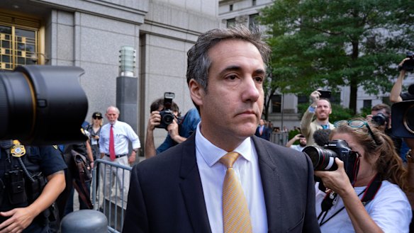 Michael Cohen, Trump's  former personal lawyer, leaves federal court after reaching a plea agreement in New York on Tuesday. 