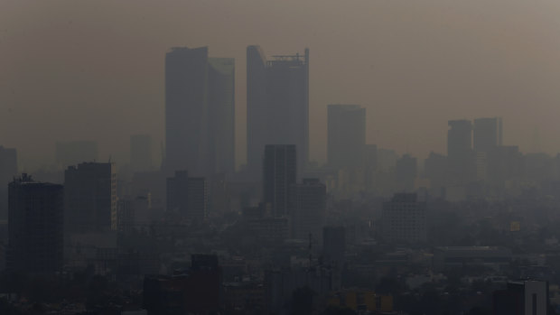 Smoke hangs over the Mexican capital on Monday.
