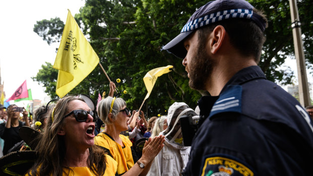 Activists from Extinction Rebellion participate in a protest in Sydney on Tuesday.