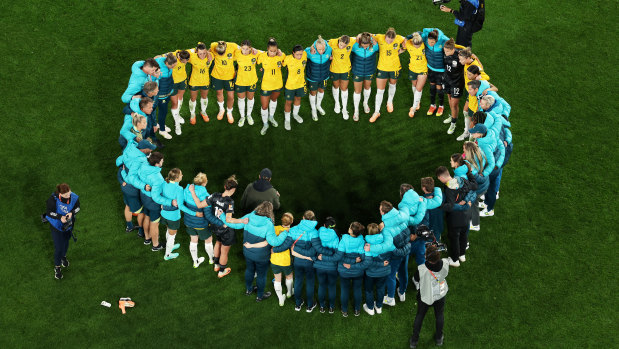 Captured our hearts: The Matildas huddle after the team’s Women’s World Cup semi-final defeat.