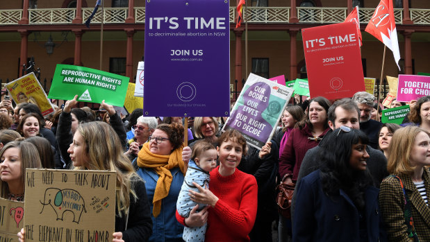 Pro-choice advocates and supporters of the Reproductive Health Care Reform Bill hold a rally outside the NSW Parliament last month.