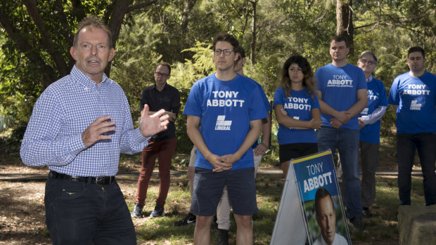 Former prime minister Tony Abbott with campaign volunteers in Manly in February.