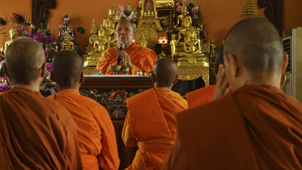 The Venerable Dhammananda, modern day Thailand’s first female Theravada Buddhist monk, leads a ceremony.