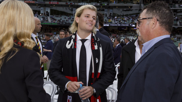 Jackson Warne speaks to David Boon at the memorial for Shane Warne.